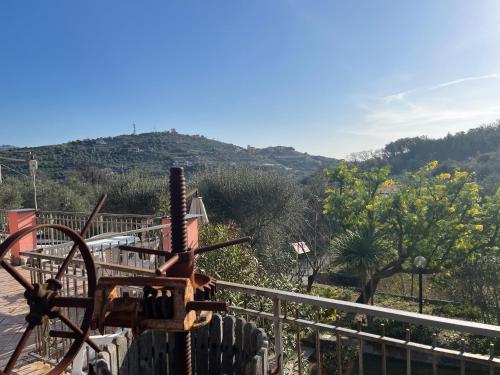 a view of a mountain from the balcony of a house at Agriturismo Le Mimose in Imperia