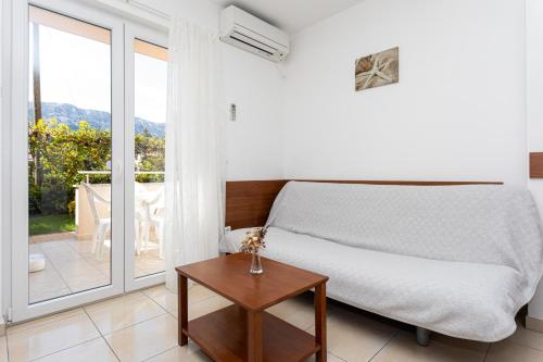 Posteľ alebo postele v izbe v ubytovaní Apartments Crneković V