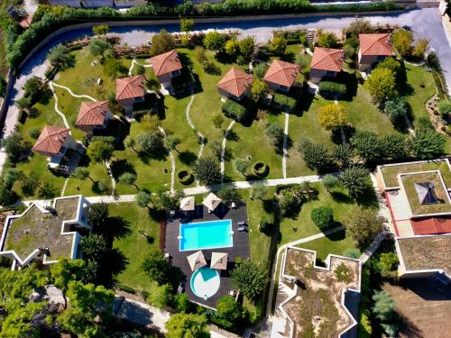 an aerial view of a house with a yard at Sani Polyastron Hotel & Spa in Sani Beach