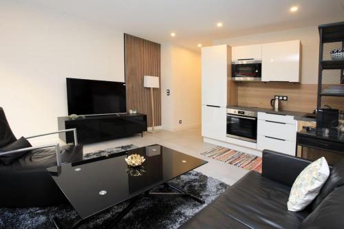 Kuchyňa alebo kuchynka v ubytovaní Appartement avec balcon Supercroisette