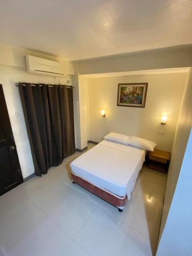 Katil atau katil-katil dalam bilik di A's Guest House