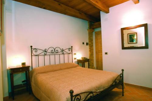 Posteľ alebo postele v izbe v ubytovaní B&B La Torretta sul Borgo