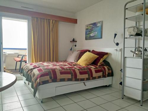 Posteľ alebo postele v izbe v ubytovaní Studio vue mer au Lydia Playa