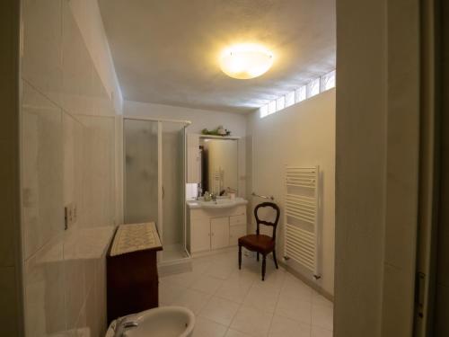a bathroom with a toilet and a sink and a shower at Tra Gli Ulivi in Pietra Ligure