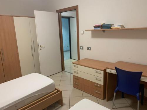 Una cama o camas en una habitación de Mood-San Matteo Residence Parva Urbi
