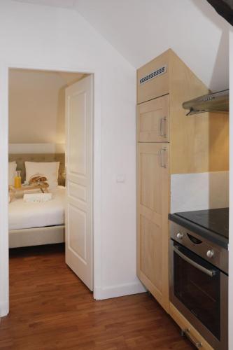 Η κουζίνα ή μικρή κουζίνα στο ROOFTOP - COSY FLAT Centre Senlis