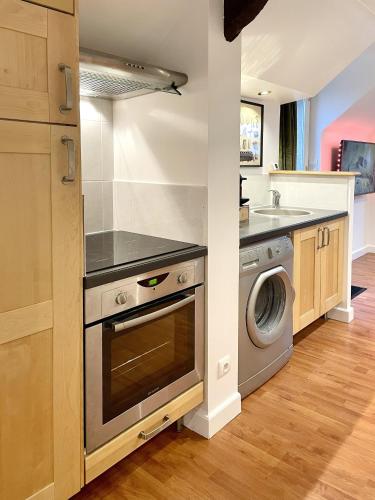 Η κουζίνα ή μικρή κουζίνα στο ROOFTOP - COSY FLAT Centre Senlis