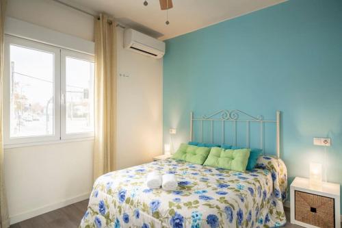 a bedroom with a bed and a window at Casa Pablo -Granada- in Granada