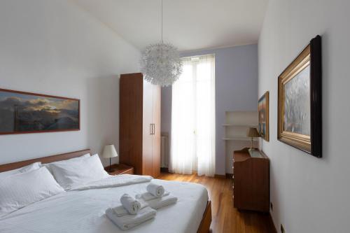 Posteľ alebo postele v izbe v ubytovaní Re Umberto luxury apartment