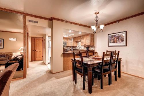 a dining room and kitchen with a table and chairs at PARK STATION 247 condo in Park City