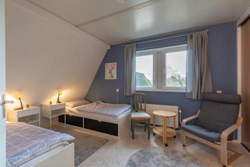 Katil atau katil-katil dalam bilik di Campanula 39 Sint Maartenszee