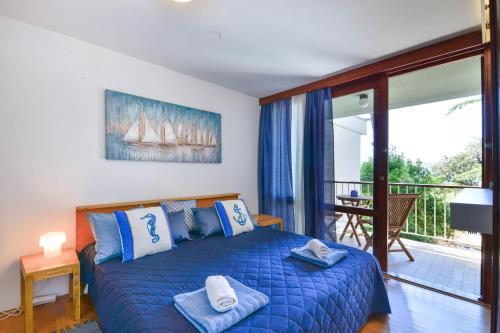 Postel nebo postele na pokoji v ubytování Holiday home Kondura with a sea view