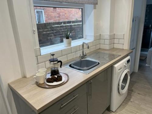 Kuchyň nebo kuchyňský kout v ubytování Oakstays Forest Hall