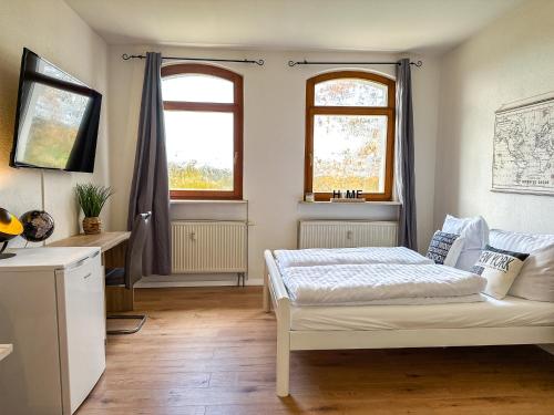 Cama ou camas em um quarto em COZY 1-Zi-Whg Nähe Straßburg & Europa Park