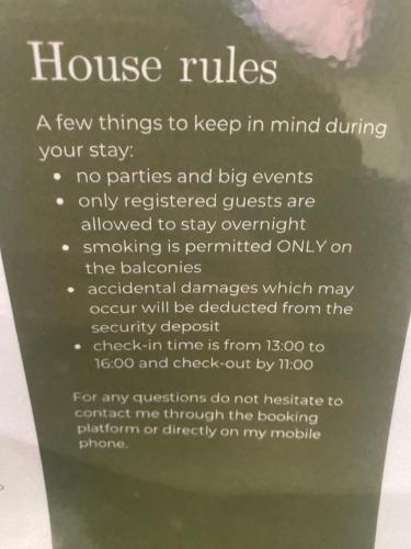 a sign that says house rules and keep in mind at FRESH HOME in Turin