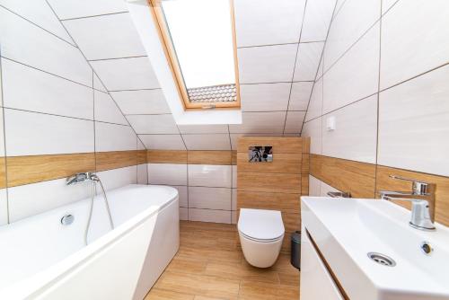 Kúpeľňa v ubytovaní Przystanek Jarosławiec De Luxe