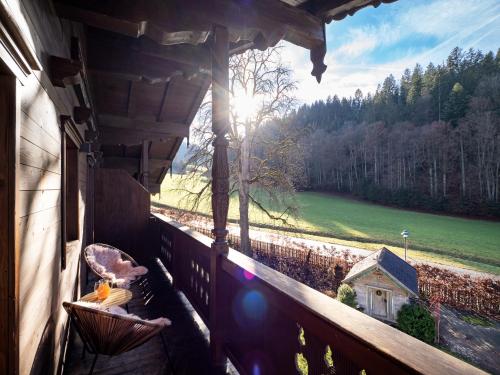 a balcony of a house with a view of a field at Bauernhof Vordermühltal in Itter