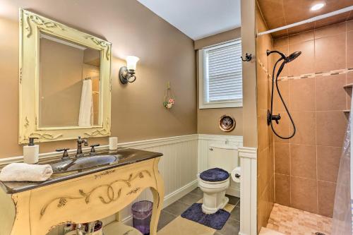 a bathroom with a sink and a toilet and a mirror at New Jersey Abode - Near the Statue of Liberty in Haskell