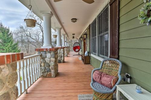 a porch of a house with a bench on it at New Jersey Abode - Near the Statue of Liberty in Haskell