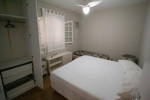 Giường trong phòng chung tại Casa - anexa ao Winner Beach Hotel (Praia da Juréia, São Sebastião)