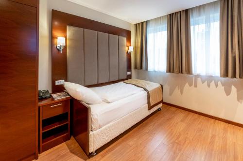 Palast Hotelにあるベッド