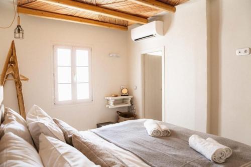 Postel nebo postele na pokoji v ubytování ΜOOI KATRINS