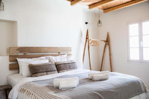 Postel nebo postele na pokoji v ubytování ΜOOI KATRINS