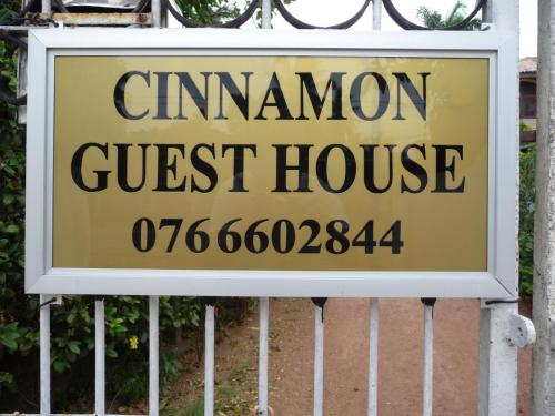 a sign for a cemomon guest house at Cinnamon Bungalow in Negombo