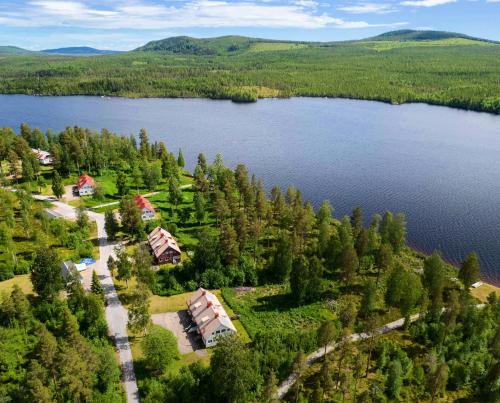 an aerial view of a resort on a lake at Vildmarks Lodge in Ytterhogdal