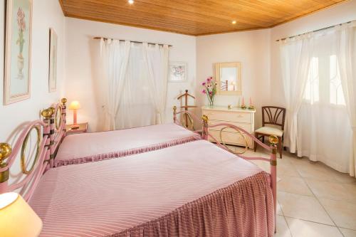a bedroom with two beds in a room at Private 2 Bed Apartment in Albufeira Old Town in Albufeira