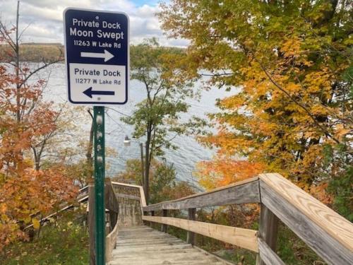 a sign in front of a bridge with at Moon Swept on Keuka in Hammondsport