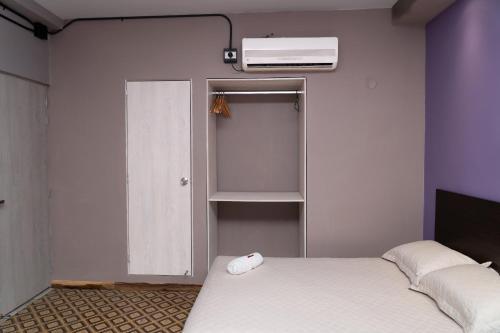 Katil atau katil-katil dalam bilik di Hotel El Meson
