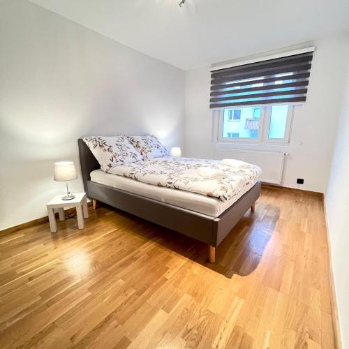 Ένα ή περισσότερα κρεβάτια σε δωμάτιο στο Spacious apartment with terrace