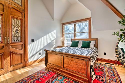 a bedroom with a bed and a window and a door at Historic Guest House on Castle Kimble Estate! in Manhattan