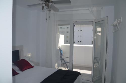 Postel nebo postele na pokoji v ubytování Myramar Beach Mare Nostrum Fuengirola