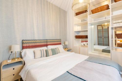 Postel nebo postele na pokoji v ubytování AC Apartamento Familiar fantástica localizacion