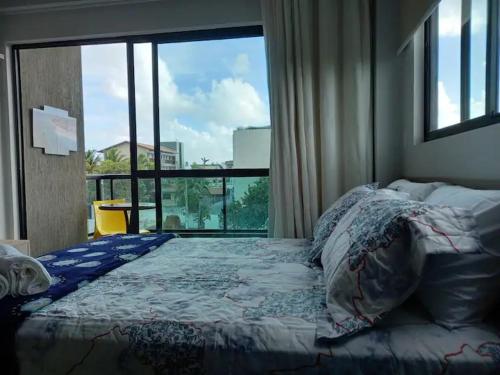 Postel nebo postele na pokoji v ubytování FLAT NOVO em Porto de Galinhas 100m da PRAIA