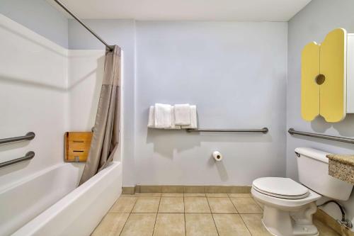 a bathroom with a toilet and a shower at Motel 6-Eagle Pass, TX - Lakeside in Eagle Pass