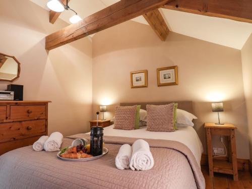 Posteľ alebo postele v izbe v ubytovaní Granary Cottage