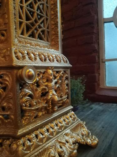 an ornate wooden door with a drawer in a house at HOTEL Boutique Casablanca Adrogué in Adrogué