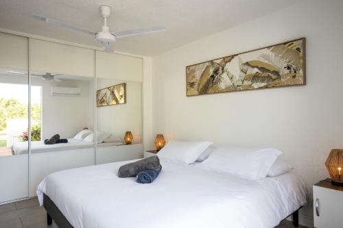 Postel nebo postele na pokoji v ubytování Baie Nettle Beach Villa 2080
