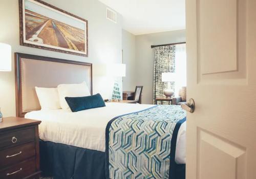 a hotel room with a bed and a window at Amazing Private Villa @ Orang Lake Resort in Orlando