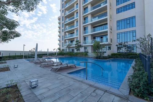 Bazén v ubytování Vogue Golf Views - Vida Emirates Hills nebo v jeho okolí