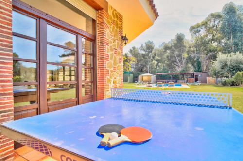 a pool table with a skateboard on top of it at Villamaresme in Sant Andreu de Llavaneres