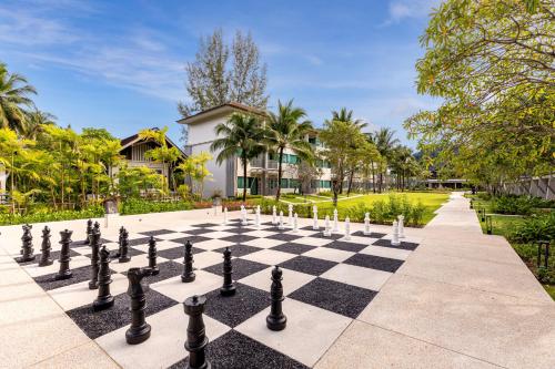 Zahrada ubytování OUTRIGGER Khao Lak Beach Resort - SHA Extra Plus