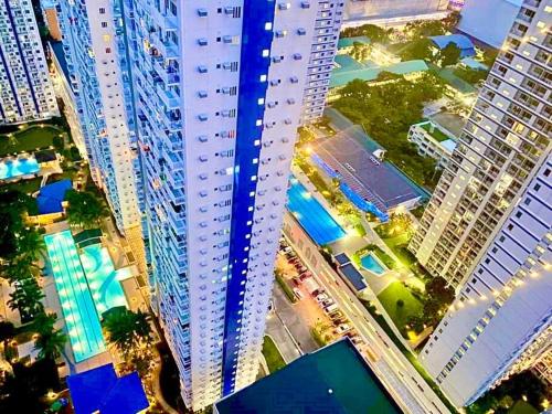 an overhead view of a city with tall buildings at Room 35 in Manila