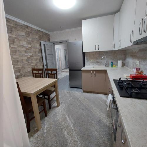 Kuchyň nebo kuchyňský kout v ubytování Apartament lux new