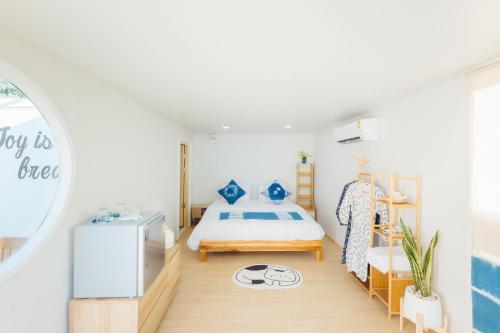 Tempat tidur dalam kamar di Ikigawa Home