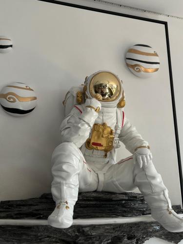a picture of a man in an astronaut suit at Planet 23 in Chiayi City