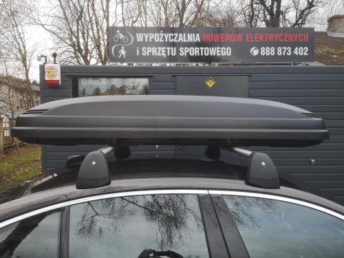 a car with the roofrack of a garbage truck at Apartament exclusive Głuszyca in Głuszyca